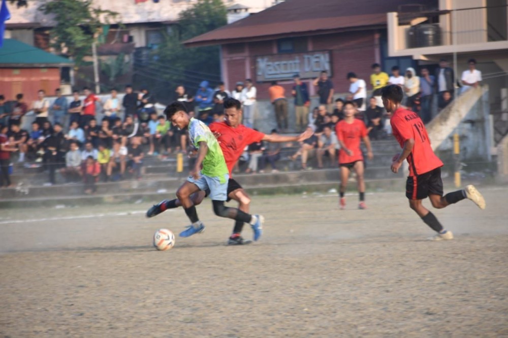 Players of Telongjem FC and KSUM in action on the sixth day of the ongoing MDFA  Trophy 2024 at Imkongmeren Sports Complex on October 21.